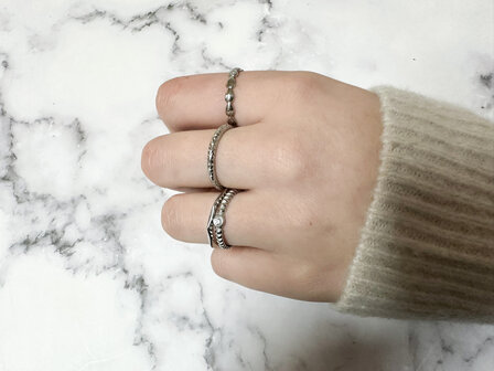 Charmin&#039;s Ring with Subtle Filled Hearts Steel R1649 &ndash; Modern Love