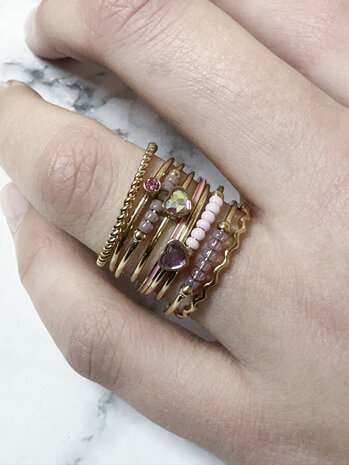 Charmin's Gold-Colored Ring with White Crystal Heart Stone Steel R1573 – Birthstone April