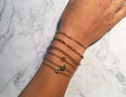 Charmin's Goldplated Gedraaid stalen armbandje CB52 Minimalistic Bracelet Gold Steel